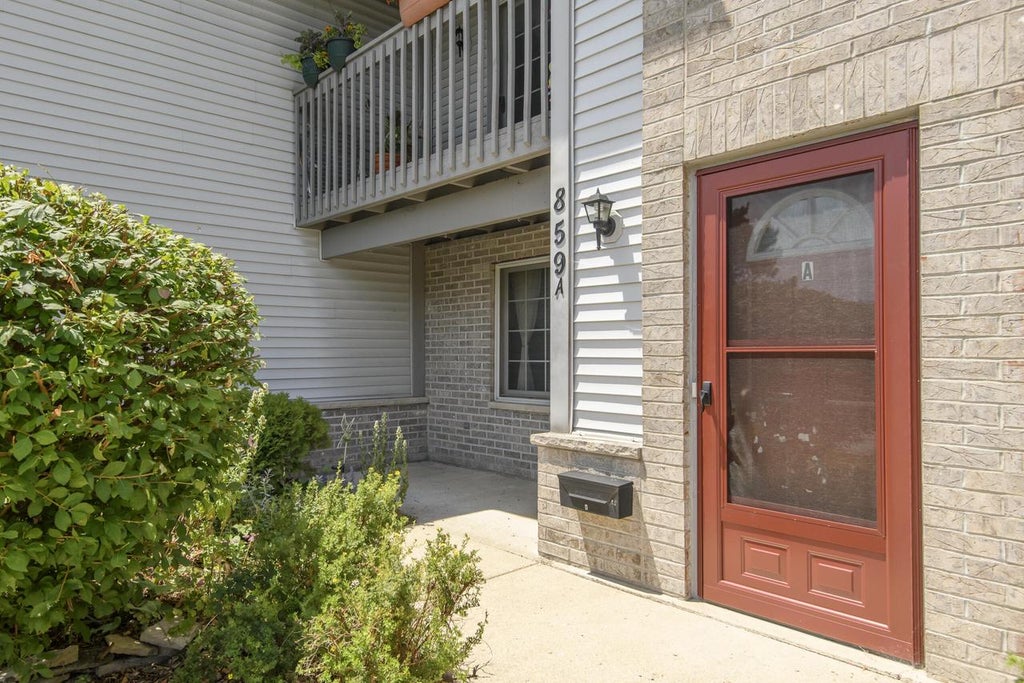 Photo of 859 Quinlan DRIVE #A, Pewaukee, WI 53072 (MLS # 1971632)
