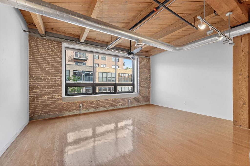 Photo of 234 E Reservoir AVENUE #203, Milwaukee, WI 53212 (MLS # 1939875)