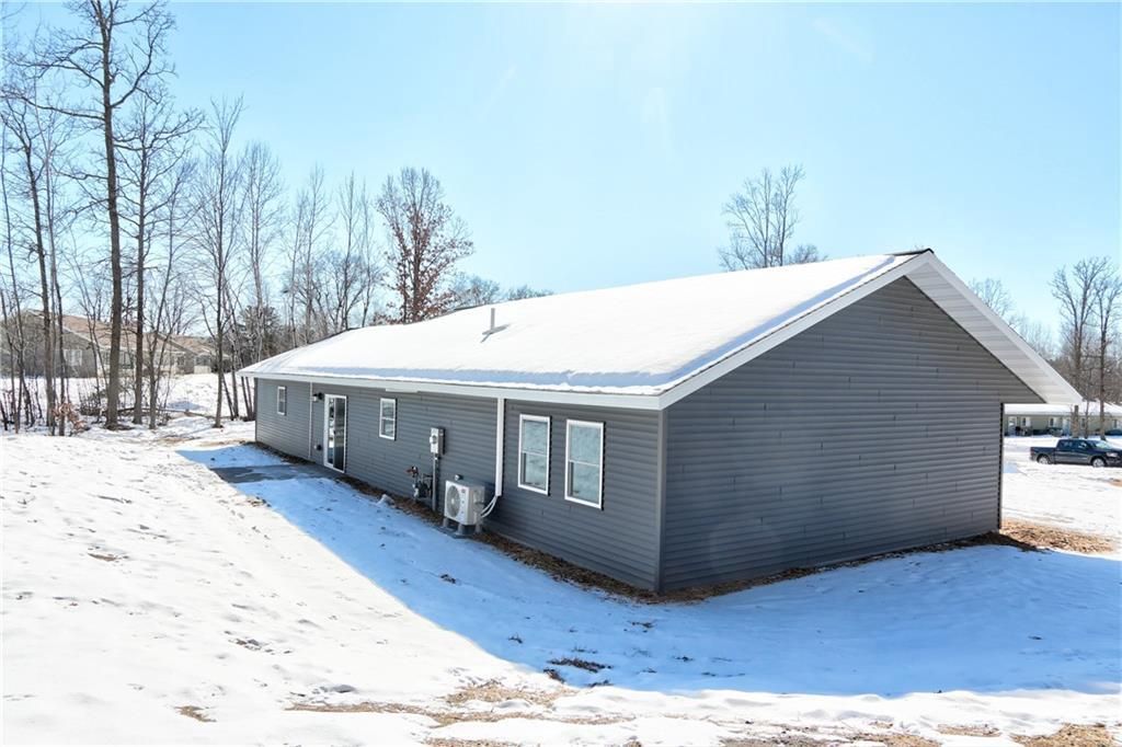 Photo of 1540 Woodland STREET, Spooner, WI 54801 (MLS # 1598726)