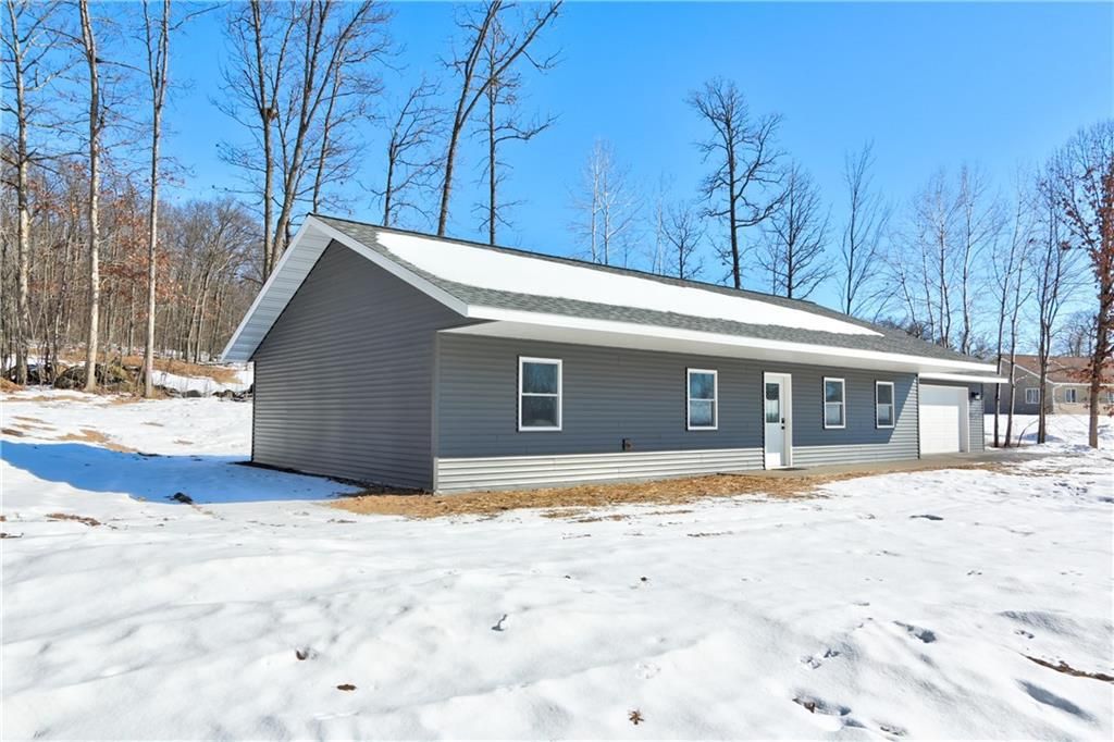 Photo of 1540 Woodland STREET, Spooner, WI 54801 (MLS # 1598726)