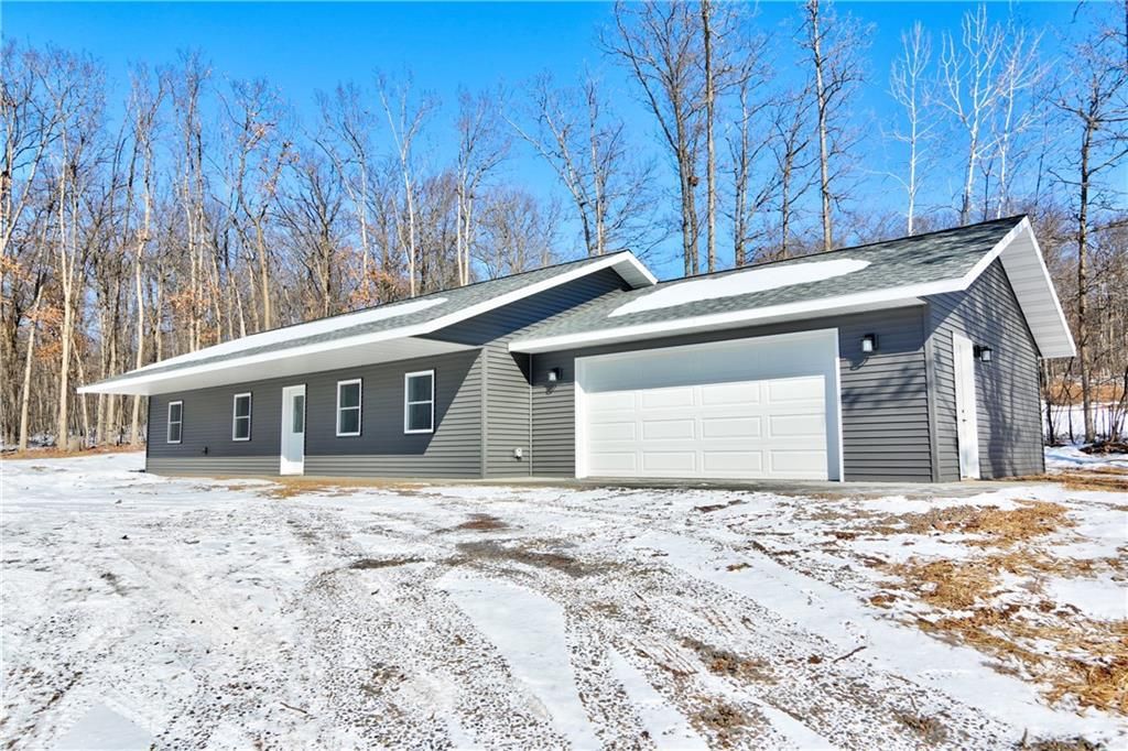 Photo of 1540 Woodland STREET, Spooner, WI 54801 (MLS # 1598726)