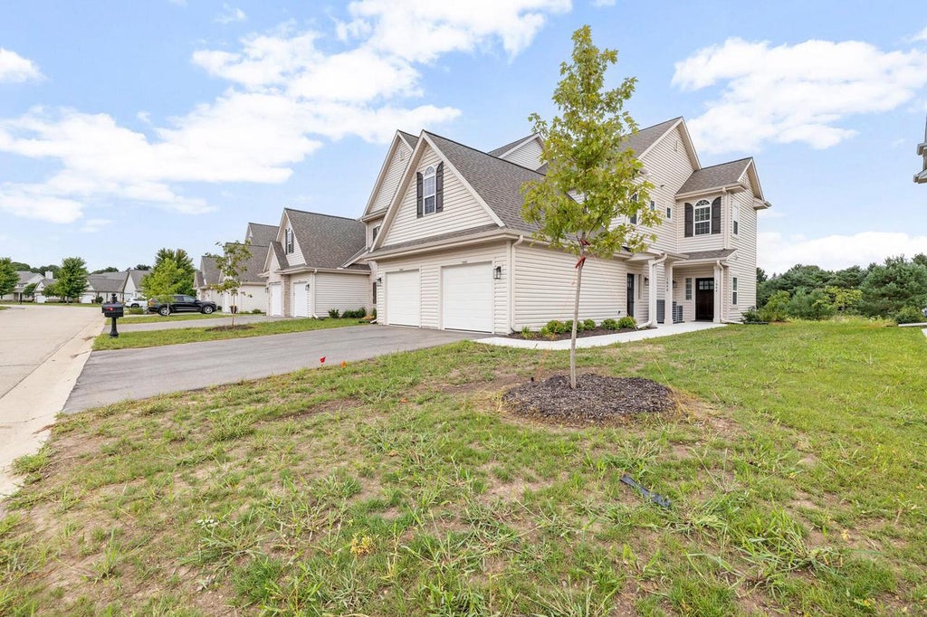 Photo of 1813 Horseshoe LANE #416-1, Slinger, WI 53086 (MLS # 1977839)
