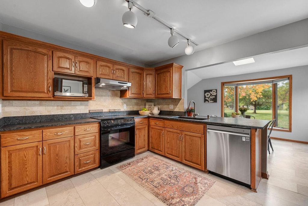 Photo of 8585 N Manor LANE, Fox Point, WI 53217 (MLS # 1938795)