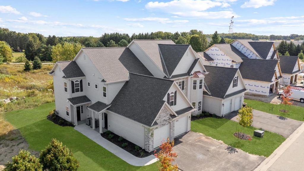 Photo of 1830 Woodland WAY #430-4, Slinger, WI 53086 (MLS # 1951386)