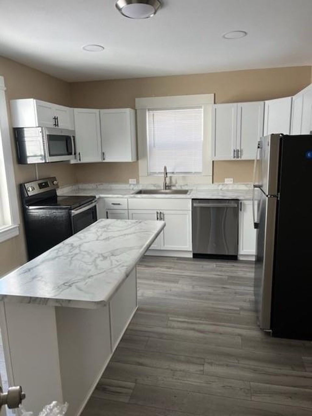 Photo of 625 Barstow STREET #1-2, Eau Claire, WI 54703 (MLS # 1598011)