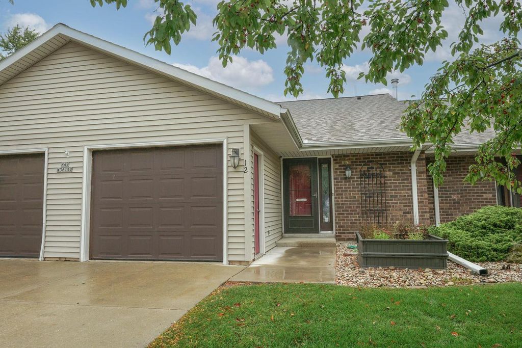 Photo of N49W36150 Nottingham LANE #12, Oconomowoc, WI 53066 (MLS # 1939165)