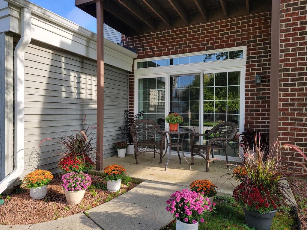Photo of N16W26571 Tall Reeds LANE #B, Pewaukee, WI 53072 (MLS # 1936633)