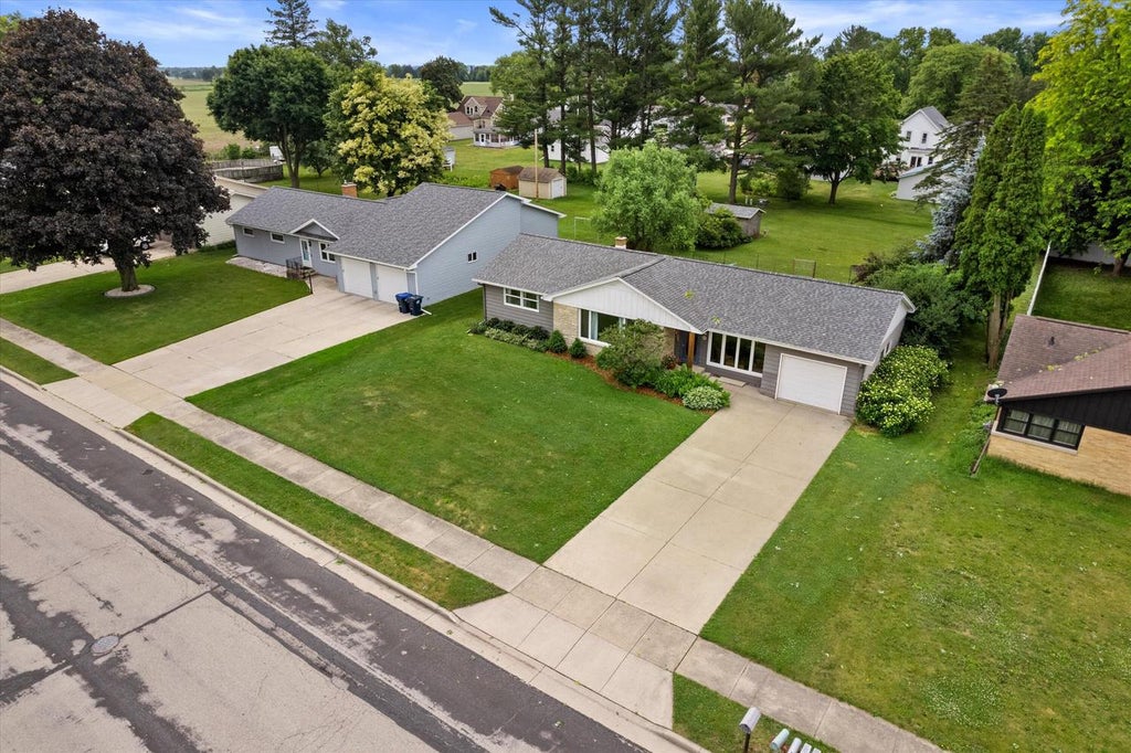 Photo of 630 E Center STREET, Juneau, WI 53039 (MLS # 1967071)