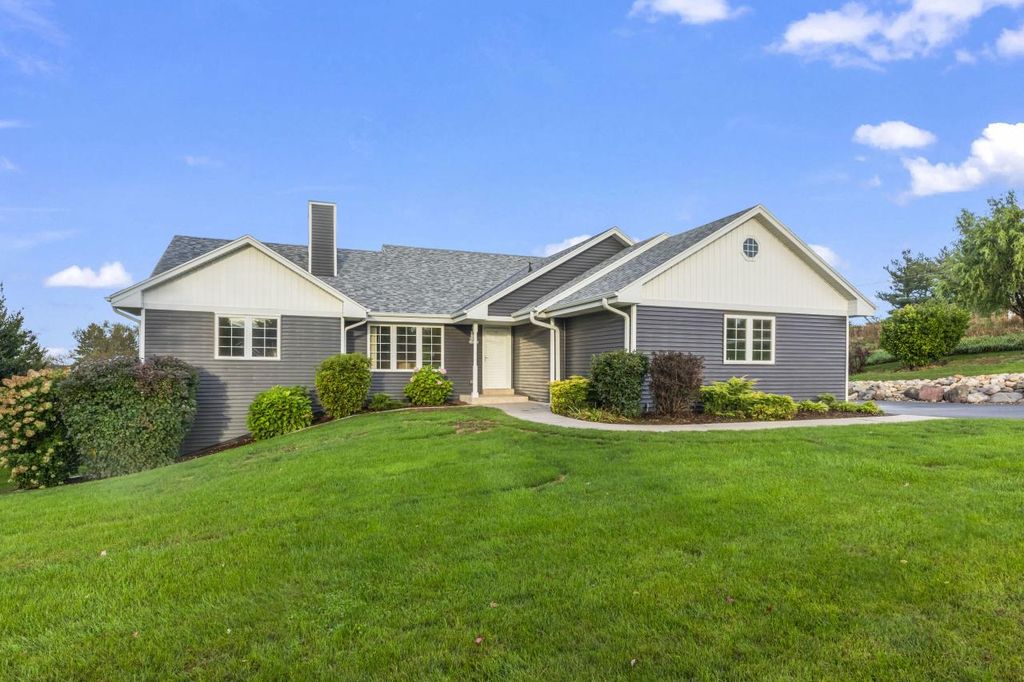 Photo of W383N8797 Blue River PASS, Oconomowoc, WI 53066 (MLS # 1938397)