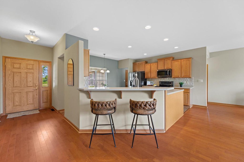 Photo of 1345 Bluebird DRIVE, Oconomowoc, WI 53066 (MLS # 1964996)