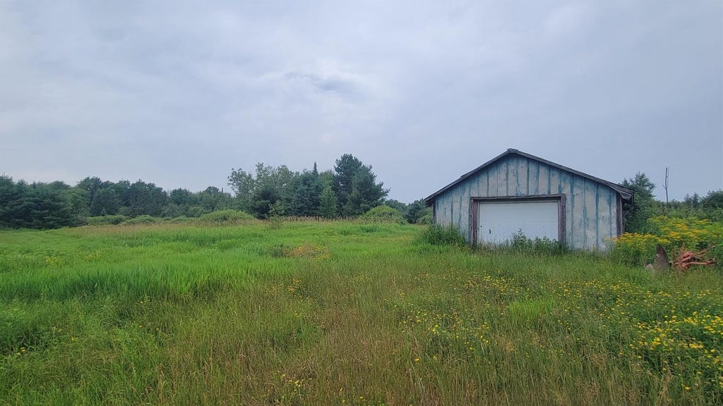 Photo of W1146 Hwy 8, Brantwood, WI 54513 (MLS # 50331161)