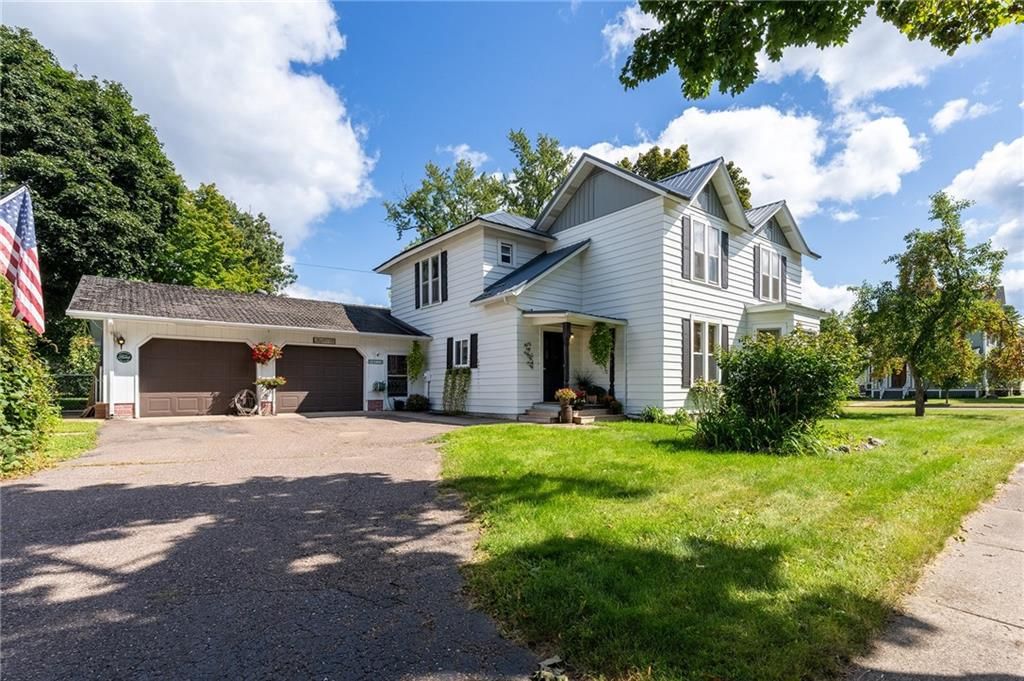 Photo of 334 W Grand AVENUE, Chippewa Falls, WI 54729 (MLS # 1595770)