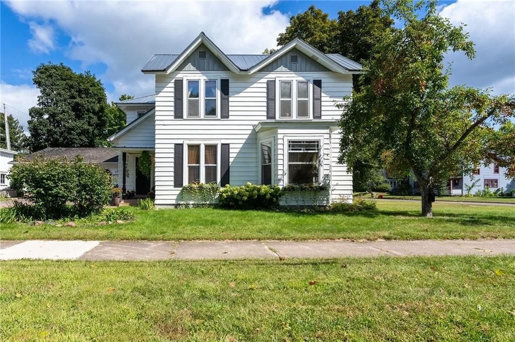 Photo of 334 W Grand AVENUE, Chippewa Falls, WI 54729 (MLS # 1595770)