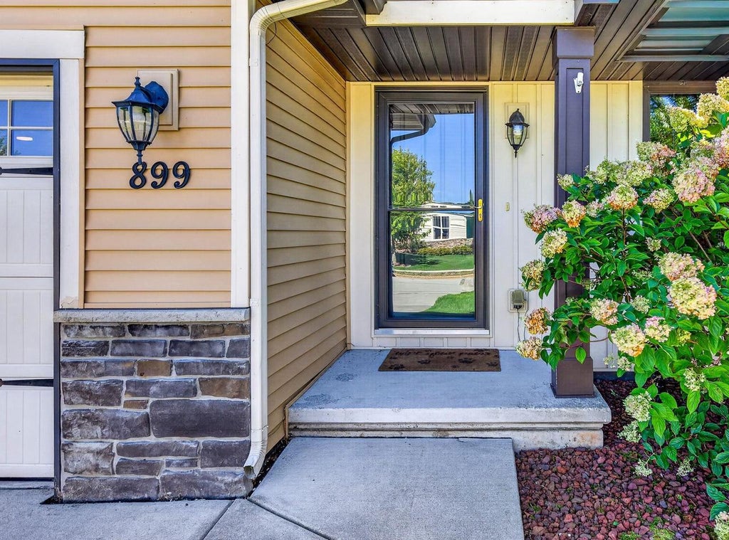 Photo of 899 Lotus TRAIL, Menasha, WI 54952 (MLS # 50332659)