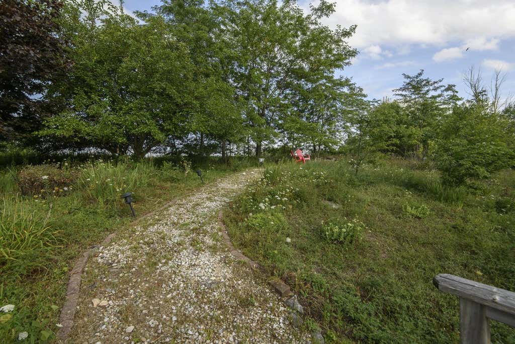 Photo of 1497 Sunnyridge ROAD, Pewaukee, WI 53072 (MLS # 1976366)