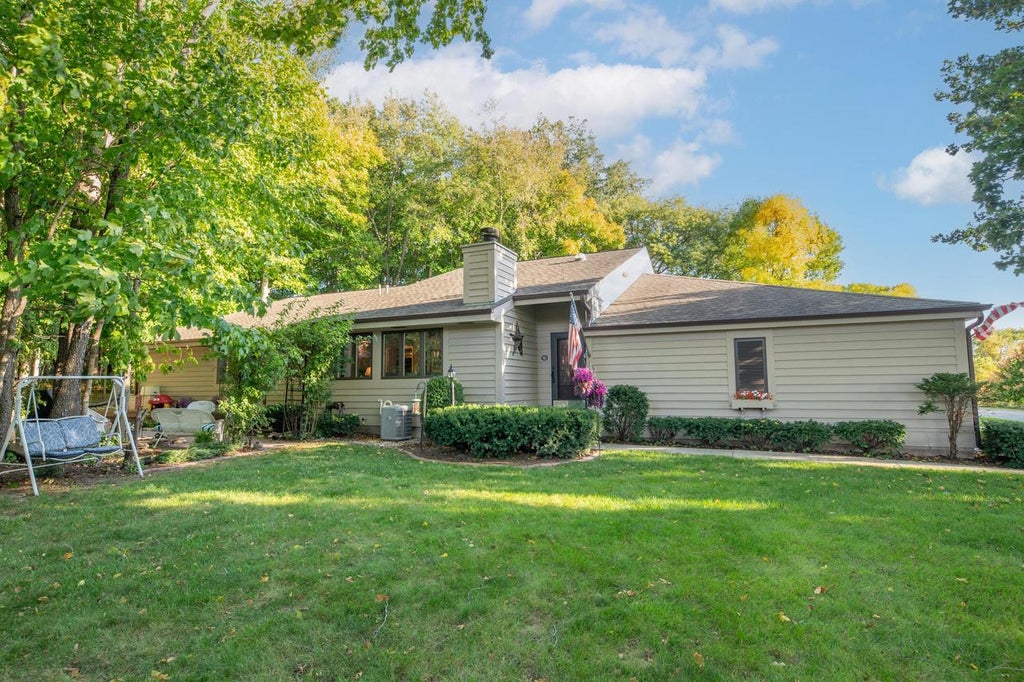 Photo of W136N8124 River Park DRIVE, Menomonee Falls, WI 53051 (MLS # 1983877)