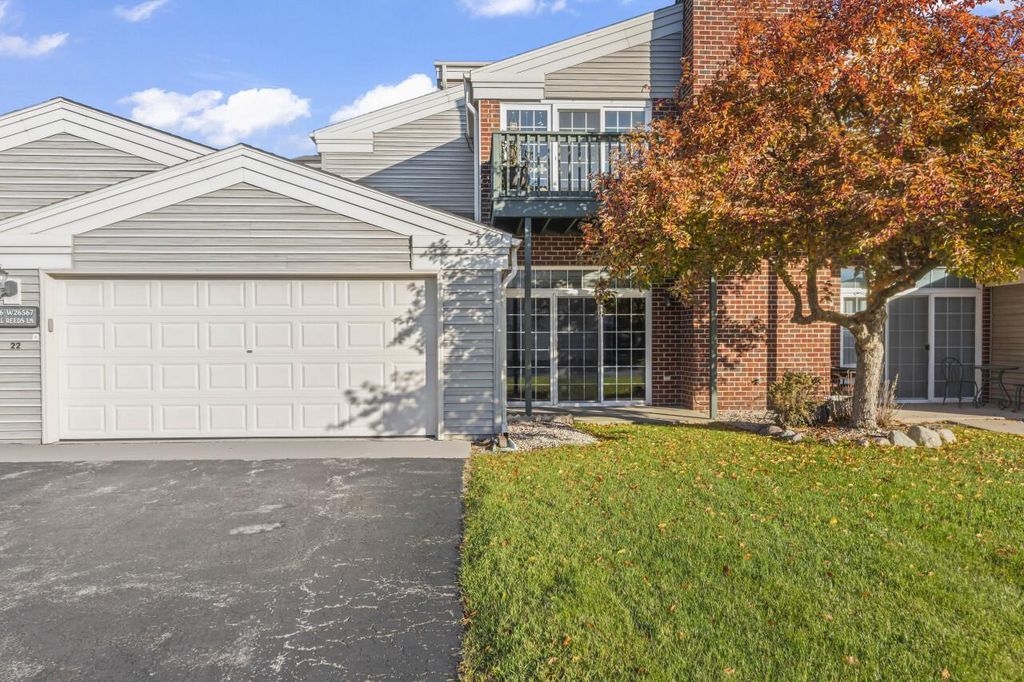 Photo of N16W26567 Tall Reeds LANE #D, Pewaukee, WI 53072 (MLS # 1941769)