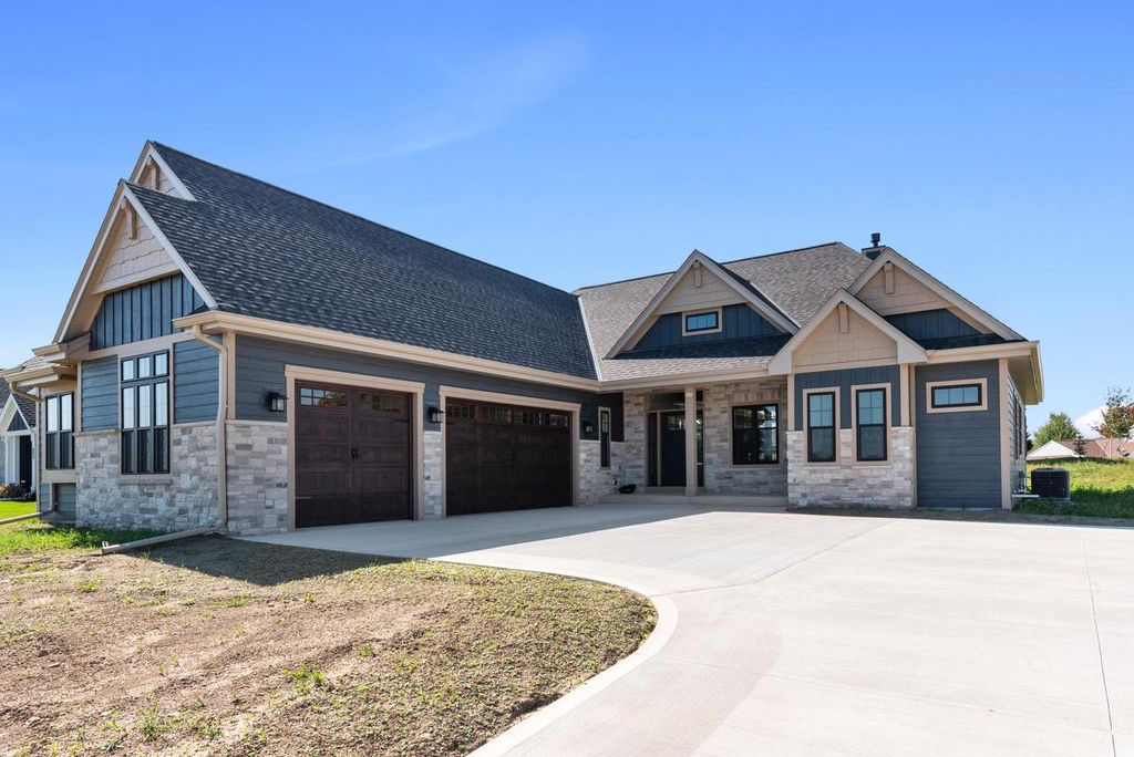 Photo of 325 Sandstone STREET, Slinger, WI 53086 (MLS # 1937688)