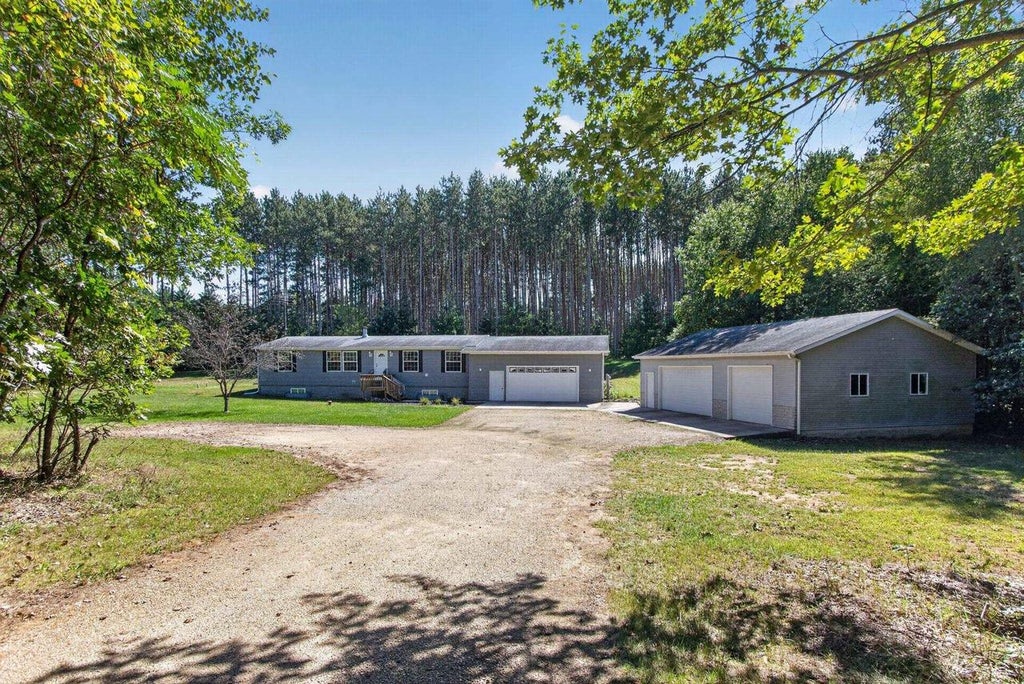 Photo of W4877 Chicago DRIVE, Redgranite, WI 54970 (MLS # 50332451)