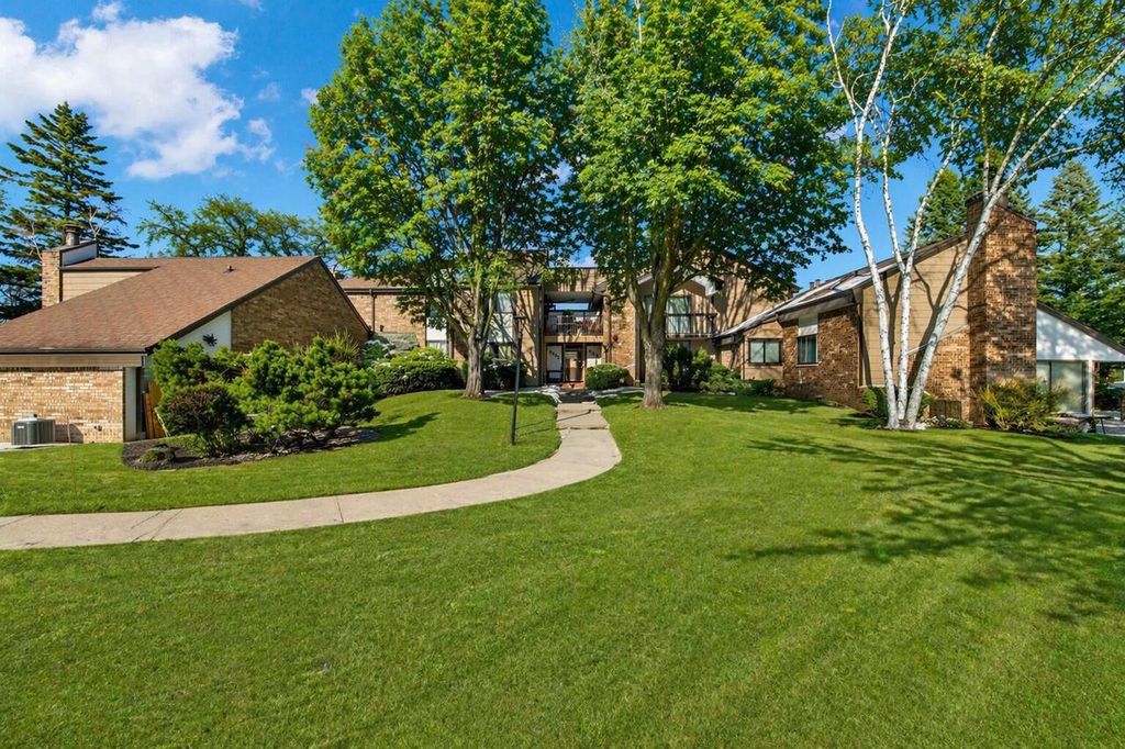 Photo of 8643 N Servite DRIVE #115, Milwaukee, WI 53223 (MLS # 1957468)