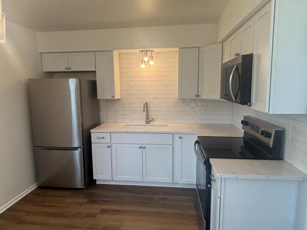 Photo of 5641 S 104th STREET #5643, Hales Corners, WI 53130 (MLS # 1965693)