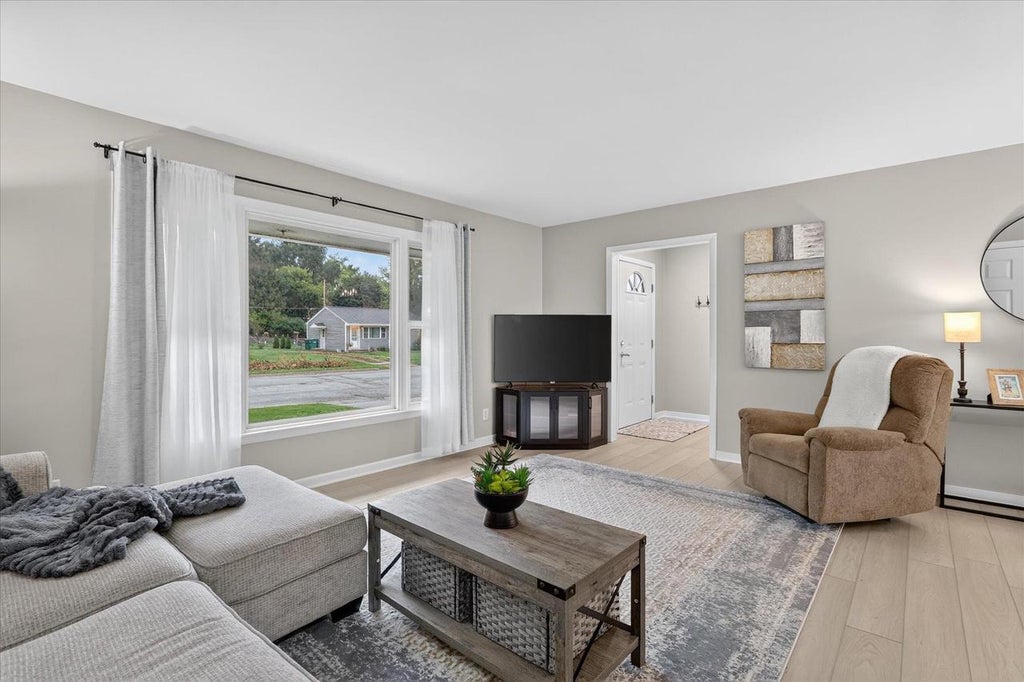 Photo of 307 South AVENUE, Edgerton, WI 53534 (MLS # 2034949)