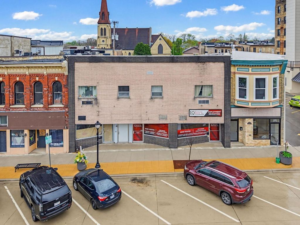 Photo of 309-313 W Milwaukee STREET, Janesville, WI 53548 (MLS # 2022089)
