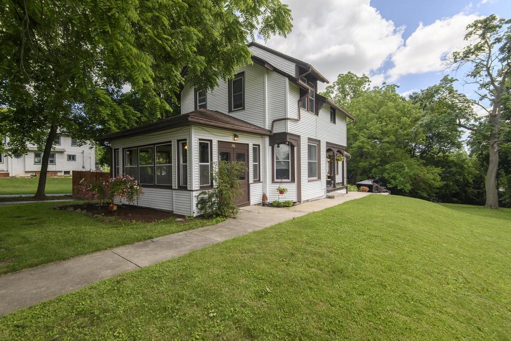 Photo of 346 High STREET, Pewaukee, WI 53072 (MLS # 1968828)