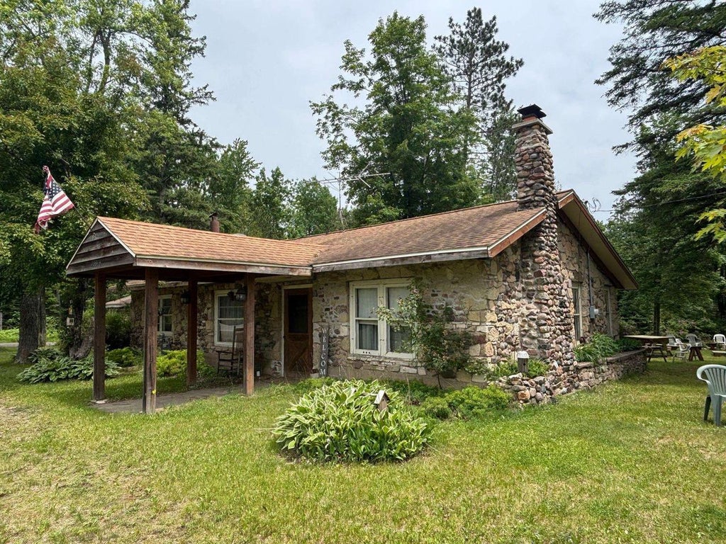 Photo of 13344 State Hwy 32 64, Mountain, WI 54149 (MLS # 50328430)