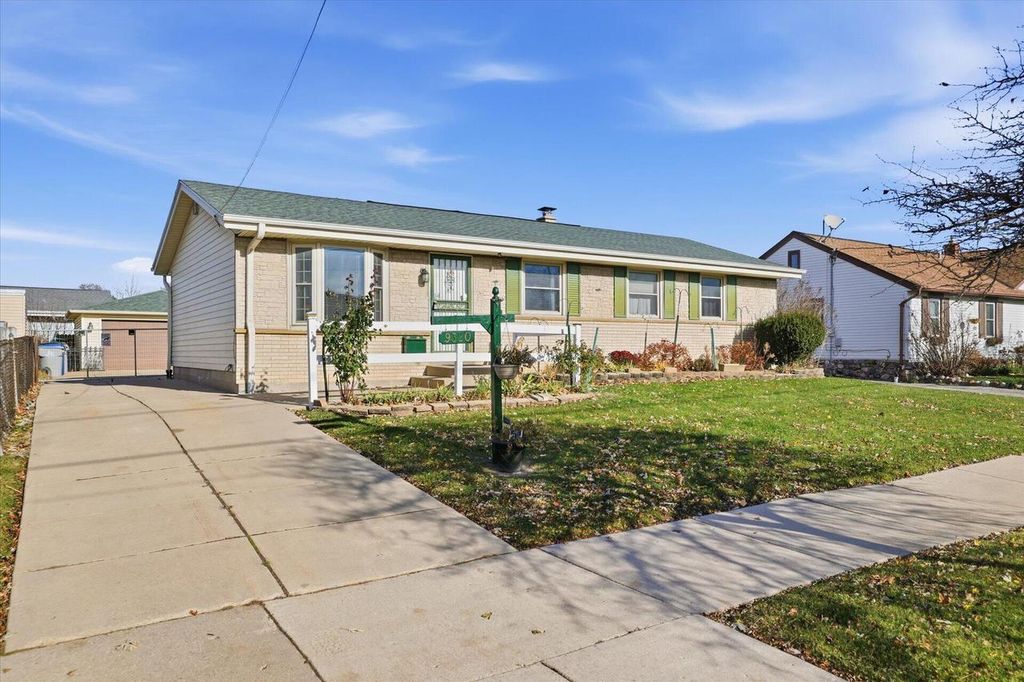 Photo of 9320 W Howard AVENUE, Milwaukee, WI 53228 (MLS # 1944164)