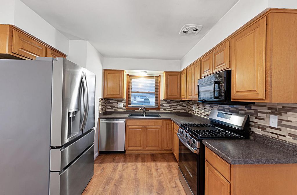 Photo of 6463 N 55th STREET, Milwaukee, WI 53223 (MLS # 1955588)