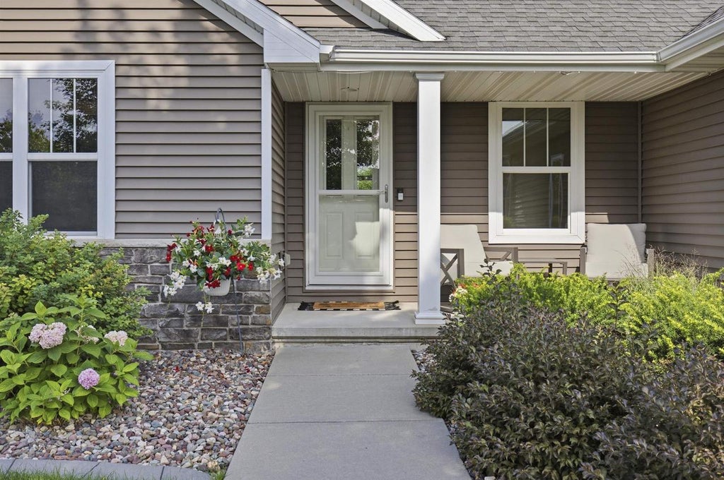 Photo of 848 Lotus TRAIL, Menasha, WI 54952 (MLS # 50330732)
