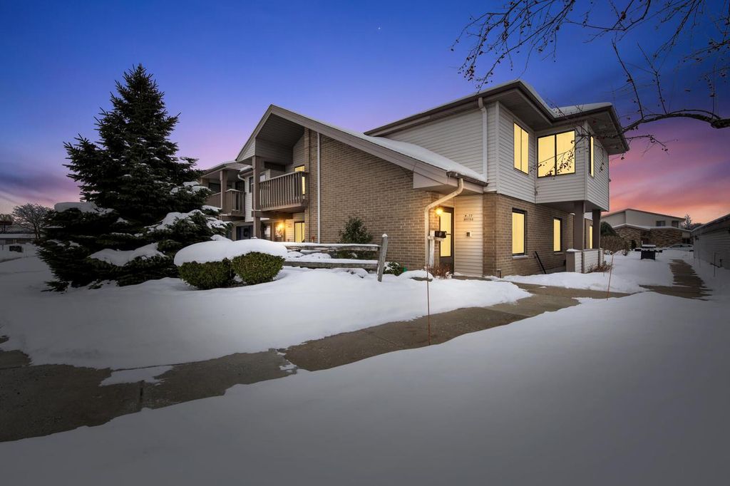 Photo of W177N9766 Riversbend CIRCLE EAST CIRCLE E, Germantown, WI 53022 (MLS # 1946775)