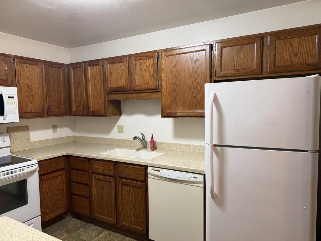 Photo of 8631 31st COURT #102, Kenosha, WI 53142 (MLS # 1979994)