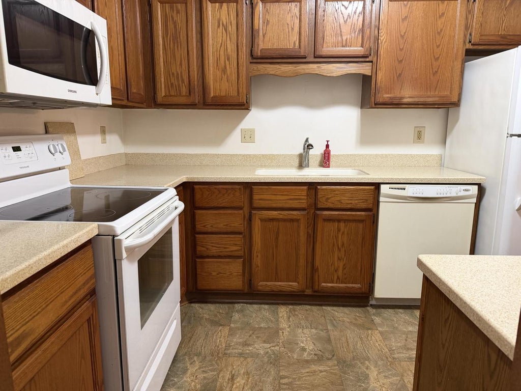 Photo of 8631 31st COURT #102, Kenosha, WI 53142 (MLS # 1979994)