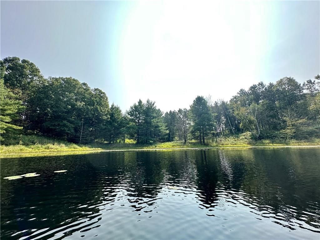 Photo of 16.43 Acres Antler Lake DRIVE, Milltown, WI 54858 (MLS # 1595999)