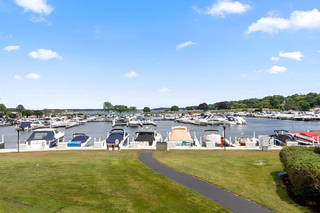 Photo of 12 Abbey Villa CIRCLE #C, Fontana, WI 53125 (MLS # 1941612)