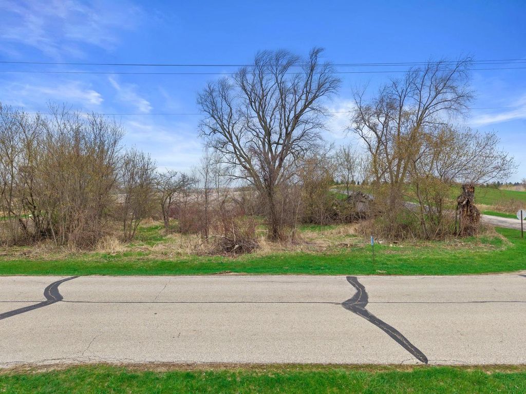 Photo of W5038 Beaver Dam ROAD, West Bend, WI 53090 (MLS # 1958472)