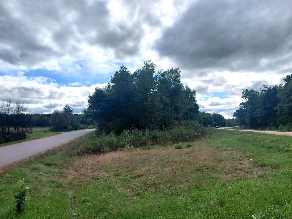 Photo of On US Highway 8 #Spring Creek Rd, Rhinelander, WI 54501 (MLS # 22604607)