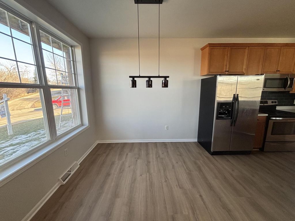 Photo of 1203 Woodbury COMMON #C, Waukesha, WI 53189 (MLS # 1950943)