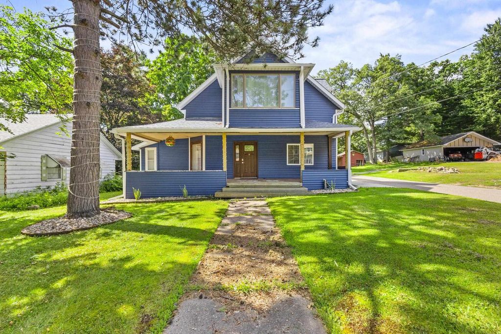 Photo of 611 W Fulton STREET, Waupaca, WI 54981 (MLS # 50320462)