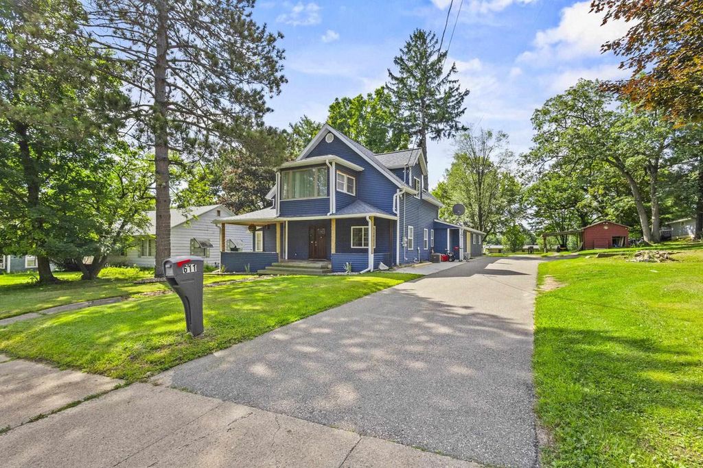 Photo of 611 W Fulton STREET, Waupaca, WI 54981 (MLS # 50320462)