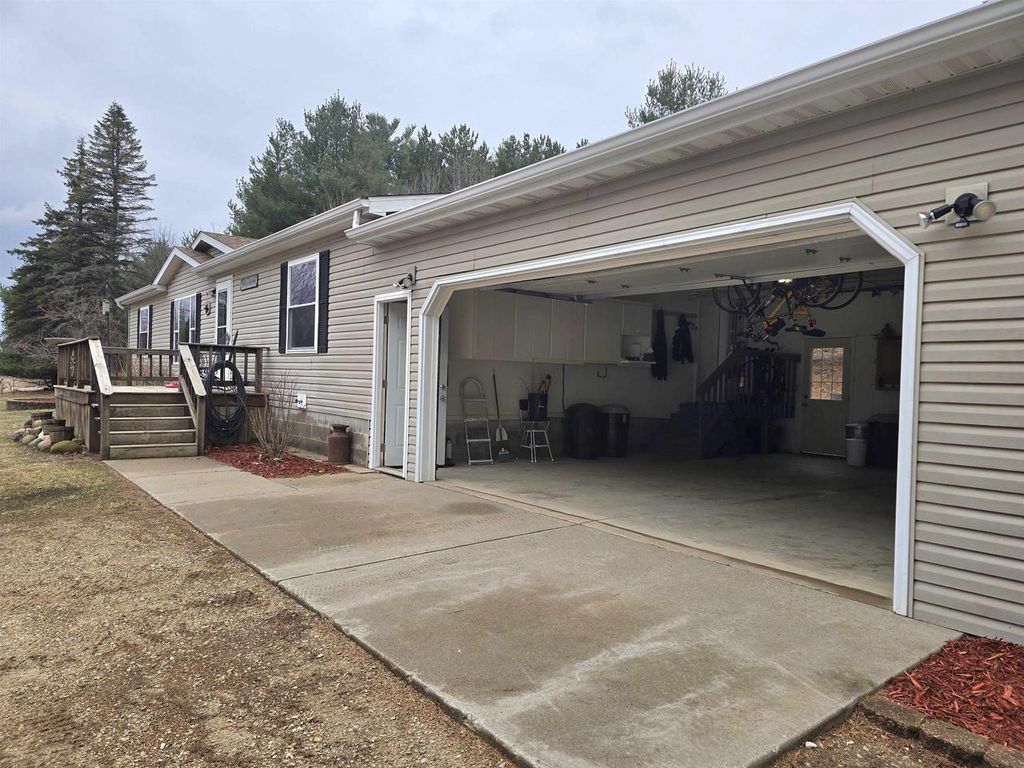 Photo of W4506 County Road Tt, Wild Rose, WI 54984 (MLS # 50323017)