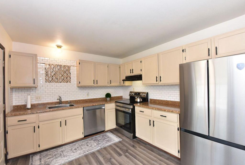 Photo of 6081 W Calumet ROAD, Milwaukee, WI 53223 (MLS # 1939373)