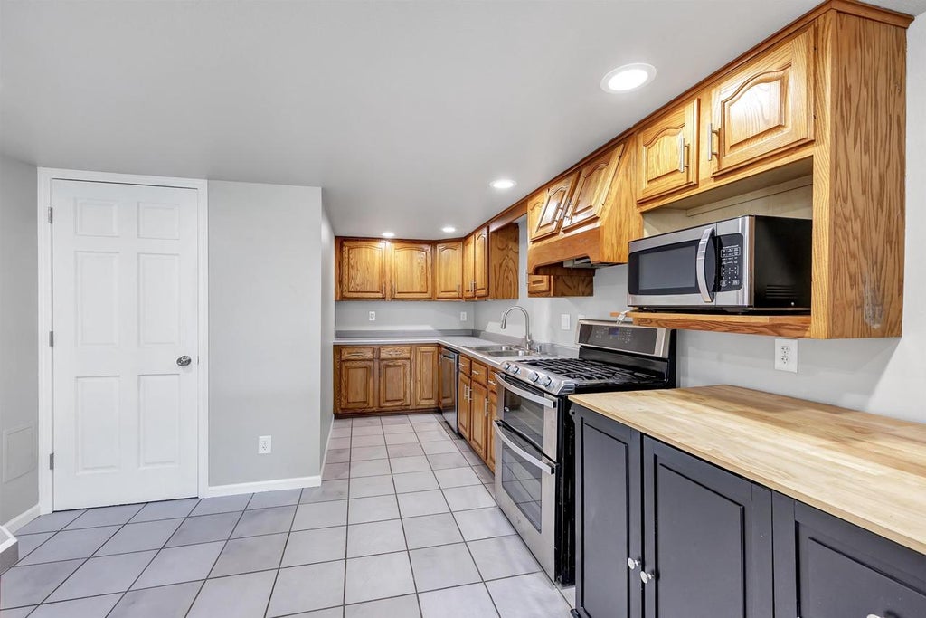 Photo of 1911 S 13th STREET, Manitowoc, WI 54220 (MLS # 50333476)