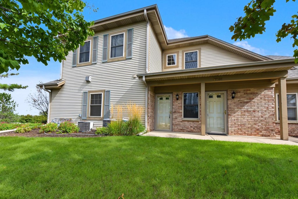 Photo of N55W17156 Ravenwood DRIVE #19156, Menomonee Falls, WI 53051 (MLS # 1980876)