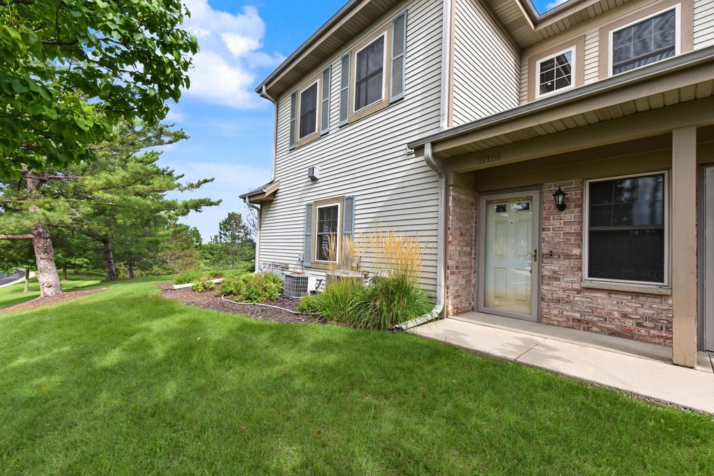Photo of N55W17156 Ravenwood DRIVE #19156, Menomonee Falls, WI 53051 (MLS # 1980876)