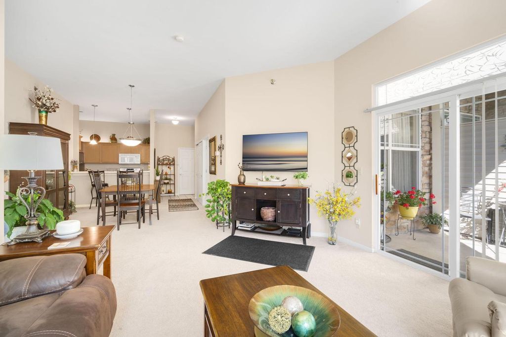 Photo of 7045 S Riverwood BOULEVARD #A02, Franklin, WI 53132 (MLS # 1943029)