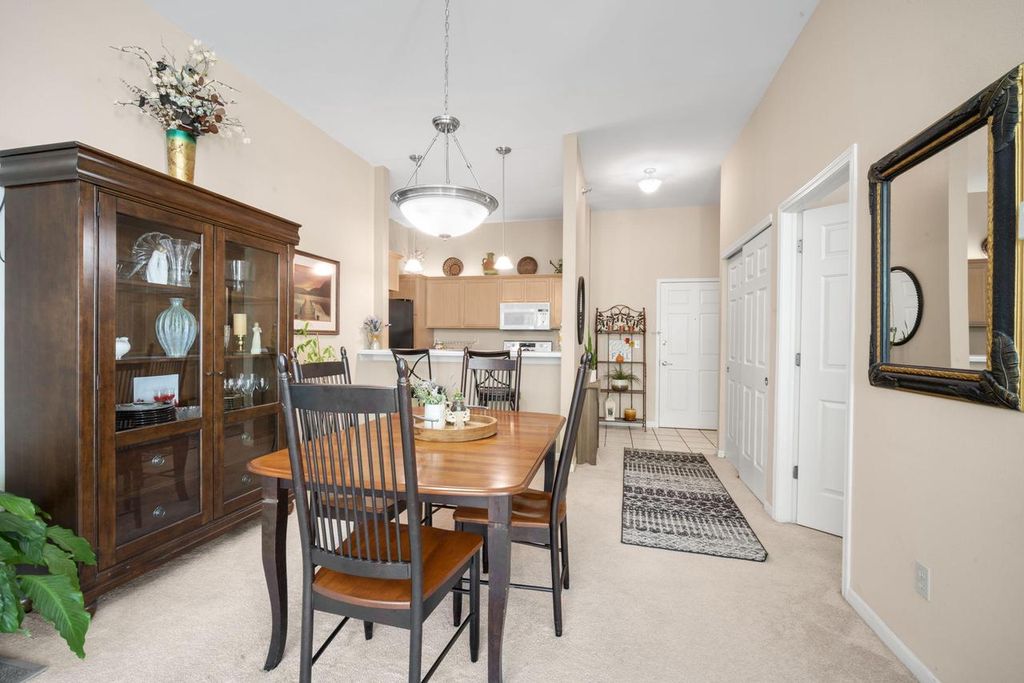 Photo of 7045 S Riverwood BOULEVARD #A02, Franklin, WI 53132 (MLS # 1943029)