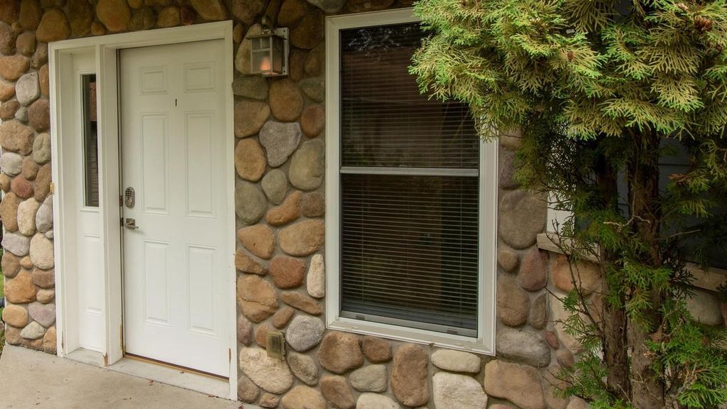 Photo of 9811 Deer Trail ROAD #Unit 2, Tomahawk, WI 54487 (MLS # 22504644)